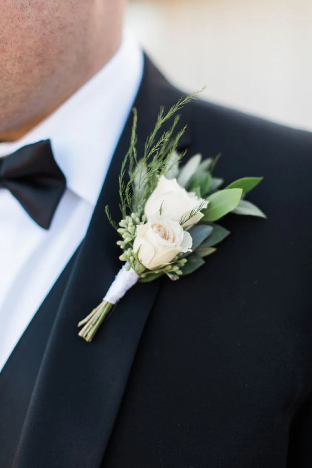 Aksesoris pengantin pria Boutonniere